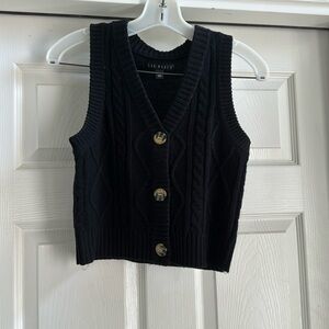 Black sweater vest